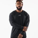 Clothing IE Alphalete Men Wolf Head LS Tee Black 2L4400544