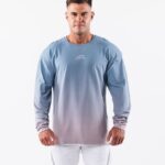 Clothing IE Alphalete Men Wolf Head LS Tee Still Water Gradient Blue 2L4400496